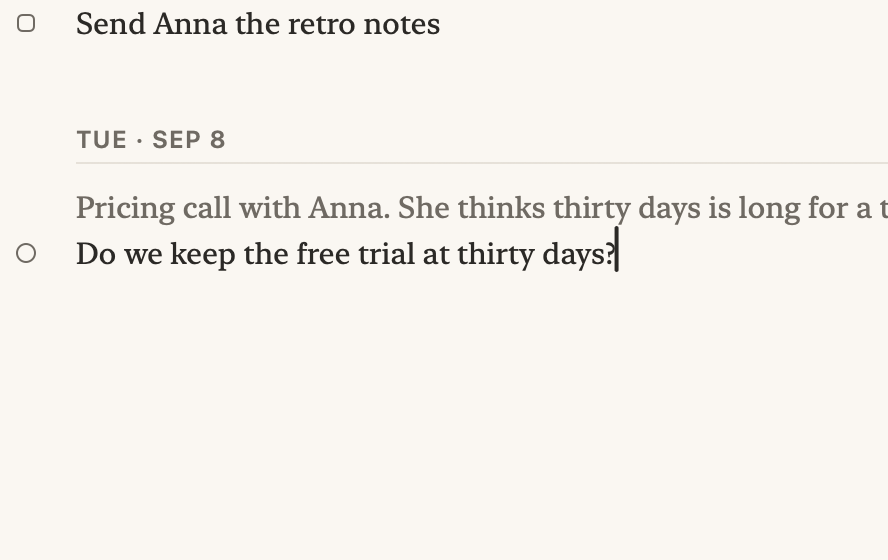 The notes' last two days, close up. The question Do we keep the free trial at thirty days is answered from the keyboard: its line is stamped answered, today's date is written, the question is copied under it, and the answer is typed under that as a decision: Keep it at thirty days until October.