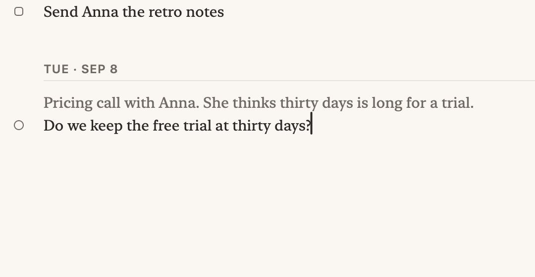 The notes' last two days, close up. The question Do we keep the free trial at thirty days is answered from the keyboard: its line is stamped answered, today's date is written, the question is copied under it, and the answer is typed under that as a decision: Keep it at thirty days until October.